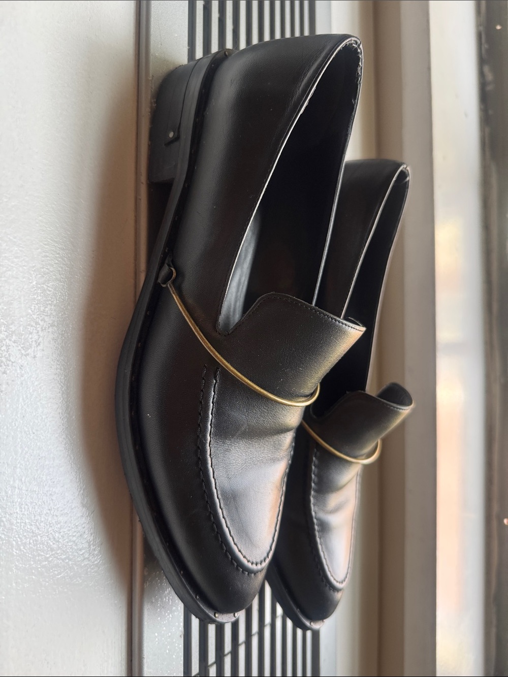 Freda Salvador LIGHT HALO LOAFER Black loafers with brass accent
